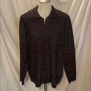 Woman’s sweater with zipper front.